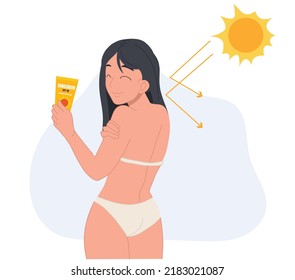 Skin care concept,sun protection.Happy woman in swimming suit using sunblock avoid from sunburn damage.