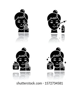 Skin care procedures drop shadow black glyph icons set. Applying sleeping cream. Using facial serum. Sunscreen on face. Moisturizing, cleansing skin. Beauty routine. Isolated vector illustrations