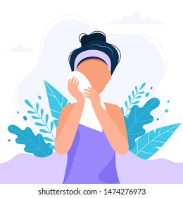 Skin care routine. Woman wiping the her face with towel, beauty routine. Cute vector illustration in flat style.