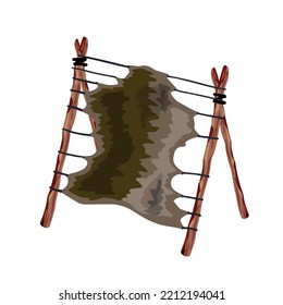 Skin on wooden frame made of sticks. Primitive manufacture of clothing