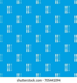 Skis and ski poles pattern repeat seamless in blue color for any design. Vector geometric illustration