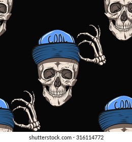 Skull with  blue cap.Black background.Seamless pattern background.