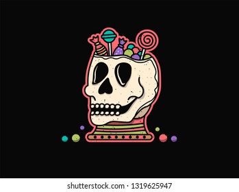 Skull with candy for halloween night. Black background. 