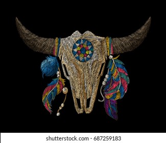Skull of a cow with feathers. Traditional folk stylish stylish embroidery on the black background. Sketch for printing on fabric, clothing, bag, accessories and design. Vector, trend