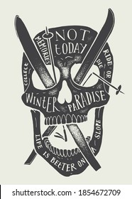 Skull with crossed skis in it. Vintage typography winter sports t-shirt print.