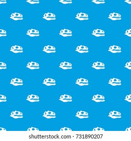 Skull of dinosaur pattern repeat seamless in blue color for any design. Vector geometric illustration