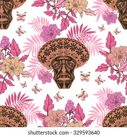 Skull with flowers and butterflies. Floral seamless pattern.