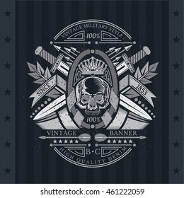 Skull front view in center of oval frame with cross arrows and swords behind. Heraldic vintage label on blackboard