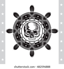 Skull front view in center of ship wheel. Marine vintage label on white