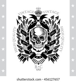 Skull front view with a lower jaw in center oval frame between wreath and cross arrows. Heraldic vintage label on white