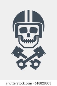 Skull in helmet and crossed piston