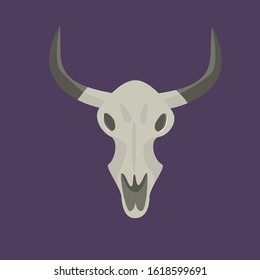 skull of a horned animal on a dark background