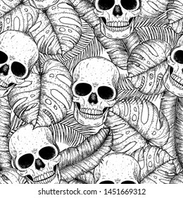 Skull and palm leaves seamless pattern. Hand drawn vector illustration. Fabric design template. Skull background. Tropical vector illustration.