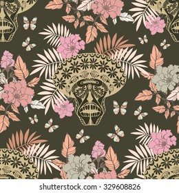 Skull with pink flowers, leaves and butterflies. Floral seamless pattern.
