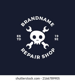Skull repair shop logo design vector illustration