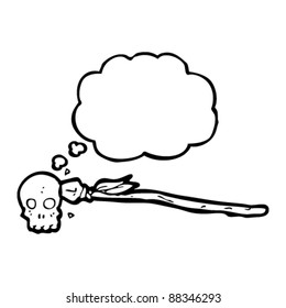 skull with spear in cartoon