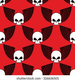 Skull with wings seamless pattern. Background of  winged head skeleton. Fabric texture for Rock musicians.