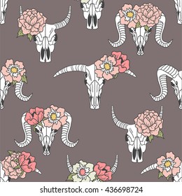 Skulls of animals and flowers hand drawn background. Doodle wallpaper vector. Colorful icon set seamless pattern