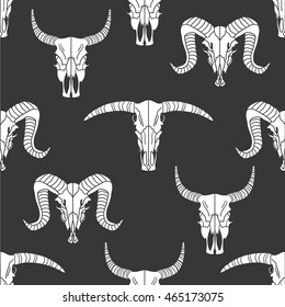 Skulls of animals hand drawn background. Doodle wallpaper vector. Black and white icon set seamless pattern