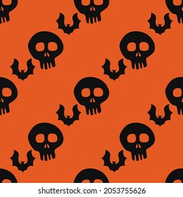 Papel tapiz de los cráneos y murciélagos. Vector repetido sin fisuras en papel o patrón de Halloween.