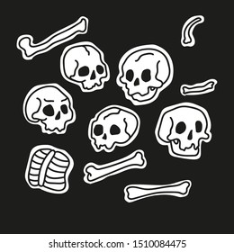 Skulls and boned white stickers on black background