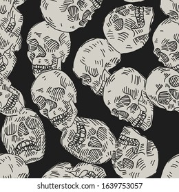 Skulls seamless pattern. Vector seamless monochrome background