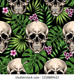 Skulls and tropical leaves. Vector seamless pattern