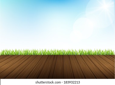 sky background and grass with wooden planks