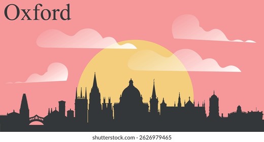 The skyline of the city of Oxford, England on the background of the big yellow sunset on the pink sky with clouds.

