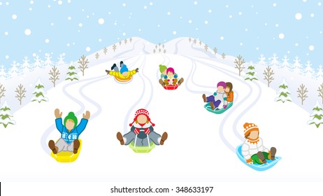 Sledding kids in snowy mountain