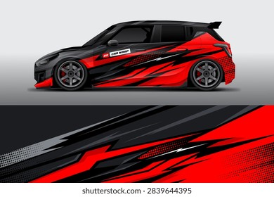 A sleek black and red wrapped hatchback car with racing decals and bold graphic design on the body.