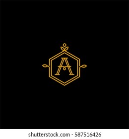 A sleek golden monogram featuring the letter A within a stylish hexagon shape. The design is surrounded by subtle decorations, highlighting sophistication, elegance, and a minimalistic artistic approa