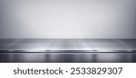 Sleek grey metal shiny surface with soft reflections and shadows. Minimalistic realistic 3d vector illustration of silver steel kitchen countertop or stainless desk surface in limbo like setting.