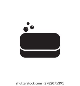 A sleek, minimalist black rectangular soap bar with a smooth texture sits against a plain white background. Three small, round bubbles float above the soap, creating a subtle, clean aesthetic with hig.