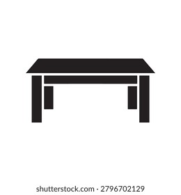 A sleek, modern flatpack table with a dark, flat surface and four tapered legs, two of which have subtle shadowed details. The table is presented against a plain background with a monochromatic, sligh.