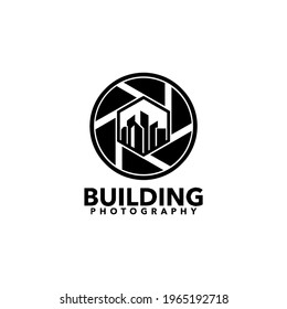 A sleek and modern vector logo featuring a circular badge design with a camera lens and building silhouette inside, symbolizing expertise in architectural and real estate photography