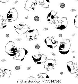Sleeping cats seamless pattern. Black and white cuddling cats dreaming about fish.