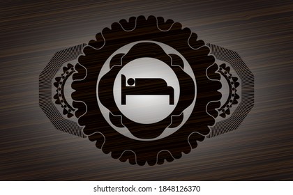 sleeping icon inside dark wood realistic badge. Brown chic background. Vector illustration. 