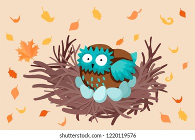 The sleeping owl in a nest, leaves fall around, dawning on the picture with a bird