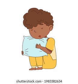 Sleepy Little African American Boy in Pajamas Sitting and Hugging Pillow Vector Illustration