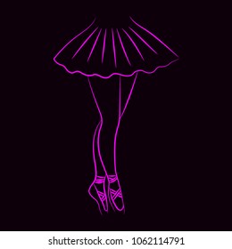 Slender ballerina feet on a dark background