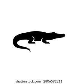 Slender crocodile or alligator in streamlined side profile, solid black silhouette vector illustration