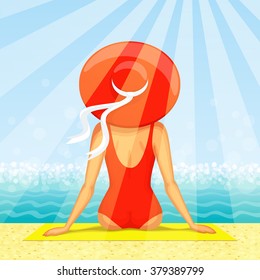 Slender woman dressed in red swimsuit with big hat at her head is sitting on the beach with seascape ahead, in sunbeams. Back view