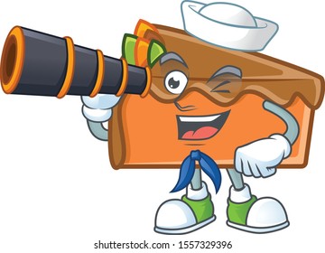 Slice cake in the cartoon character sailor holding binocular.