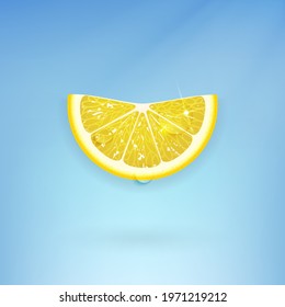 slice of juicy lemon on a background of blue water