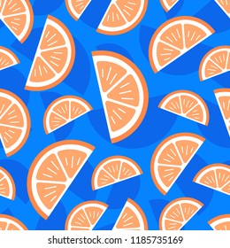 Slice of orange seamless pattern. Orange pieces on blue background.