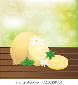 Sliced and full lemons on table with camomile and mint composition 
