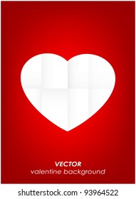 Sliced paper folded heart on red background