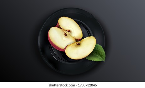 Sliced red apple on a black plate.