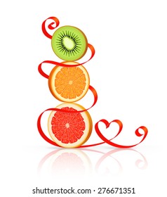 Slices of grapefruit, orange and kiwi are standing one on another, red ribbon with heart-shaped curl around